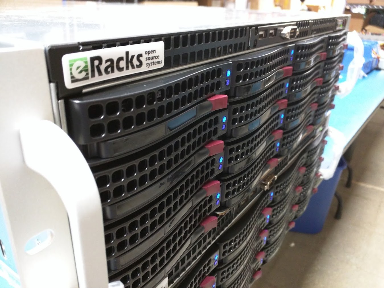 A stack of eRacks 1U rackmount servers on the build bench
